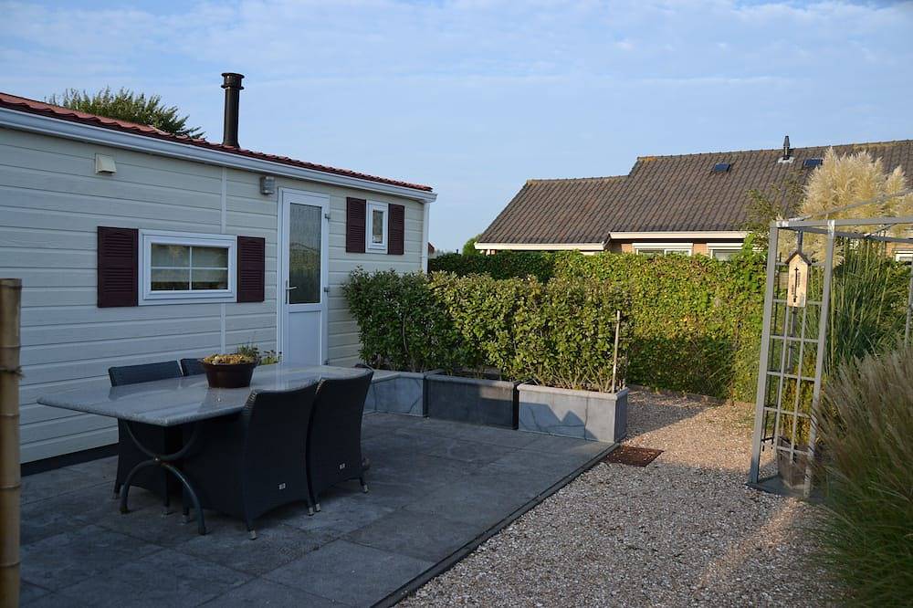 Comfort chalet direct aan het strand in het zonnige Zeeland in Groot Valkenisse, Biggekerke