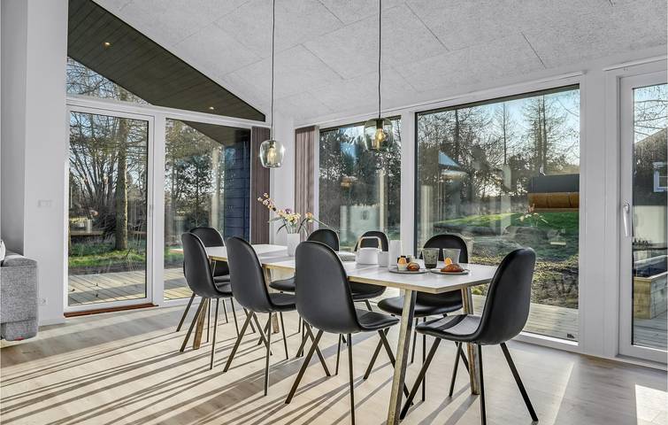 Ferienhaus für 9 Personen mit Terrasse in Fjellerup Strand, Djursland