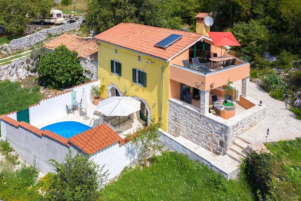 Rustic stone house with a pool and ocean view in Rabac, Eastcoast Istria