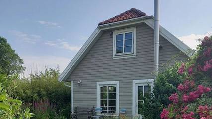 Ferienhaus für 2 Personen, mit Terrasse und Garten sowie Sauna in Niesgrau