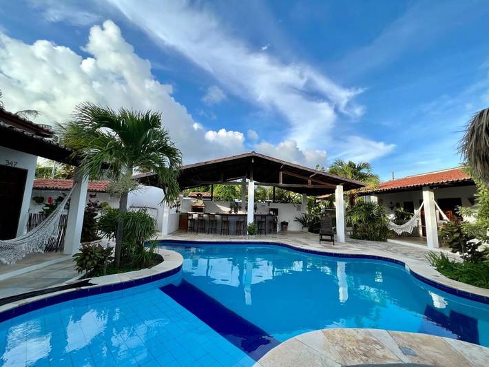Pousadas para 2 pessoas, com jardim e piscina infantil e ainda vista and piscina em Paracuru