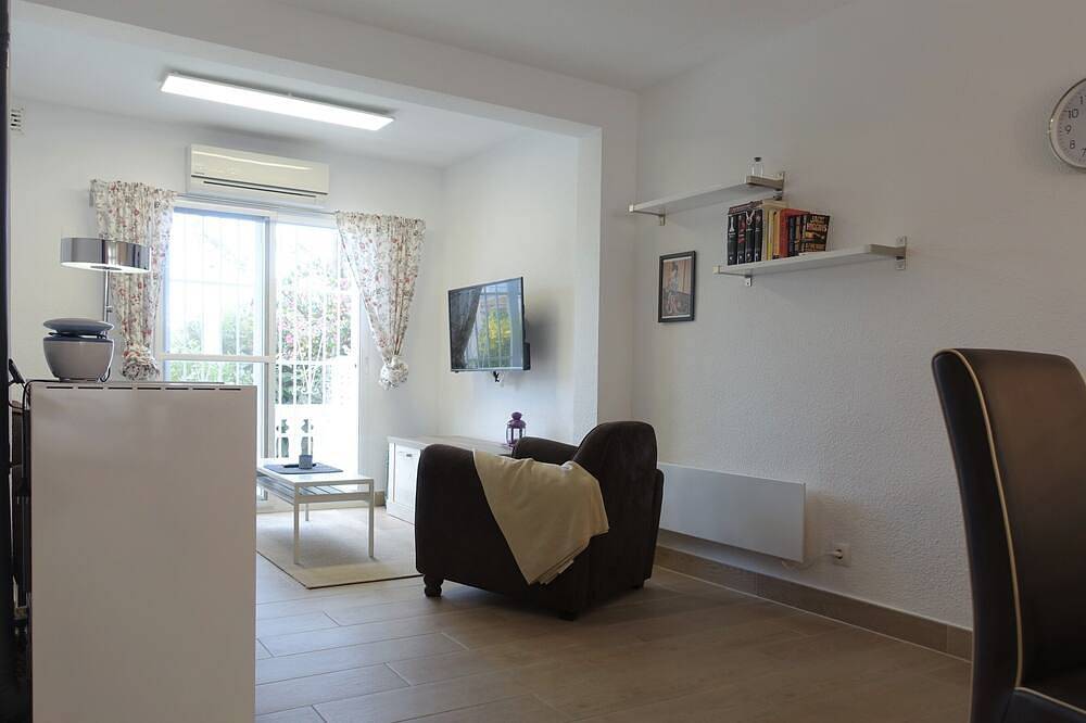 Geheel appartement, Albir Appartement in huis met gemeenschappelijk zwembad, met de tuin in L'Albir, L'Alfàs del Pi