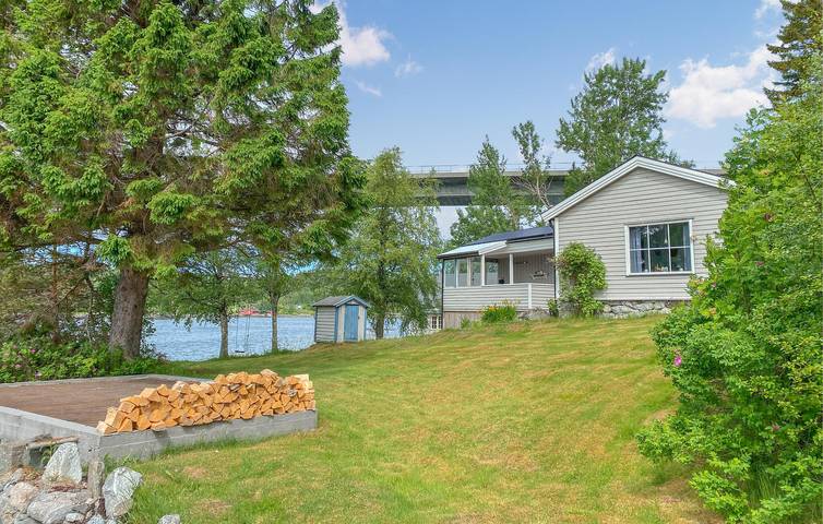 Ferienhaus für 6 Personen, mit Terrasse und Garten sowie Ausblick in Tingvoll