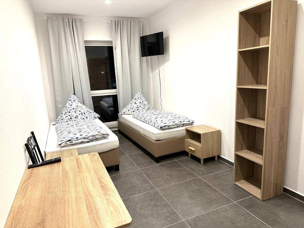 Appartement de vacances entier, Gemütliches Doppelzimmer Gemeinschaftsbad in Dingolfing, Bavière Orientale