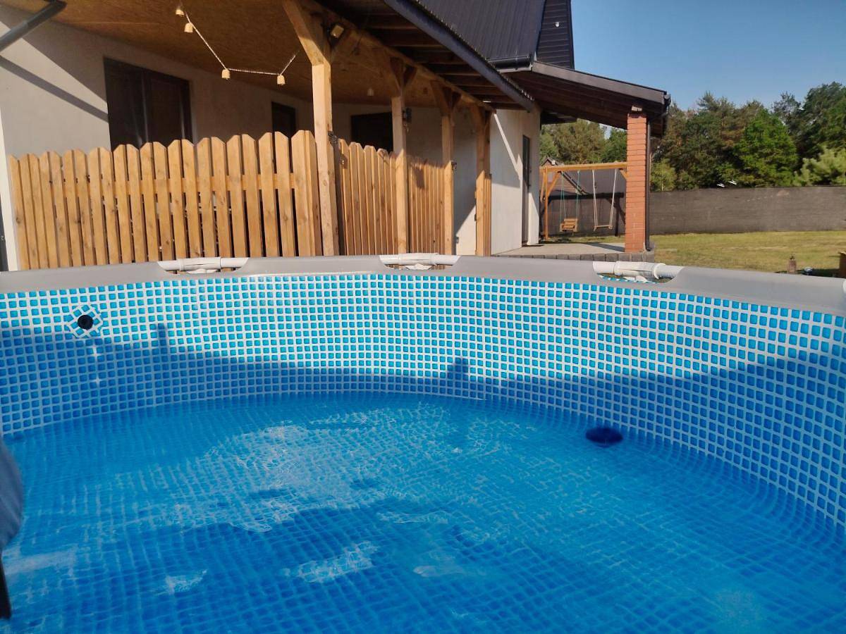 Całoroczny dom wypoczynkowy pod Lasem z prywatnym jaccuzii in Lublin und Umgebung