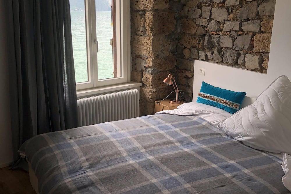 Schönes Ferienhaus direkt am See - privater Seezugang und herrliche Aussicht in Osteno, Claino con Osteno