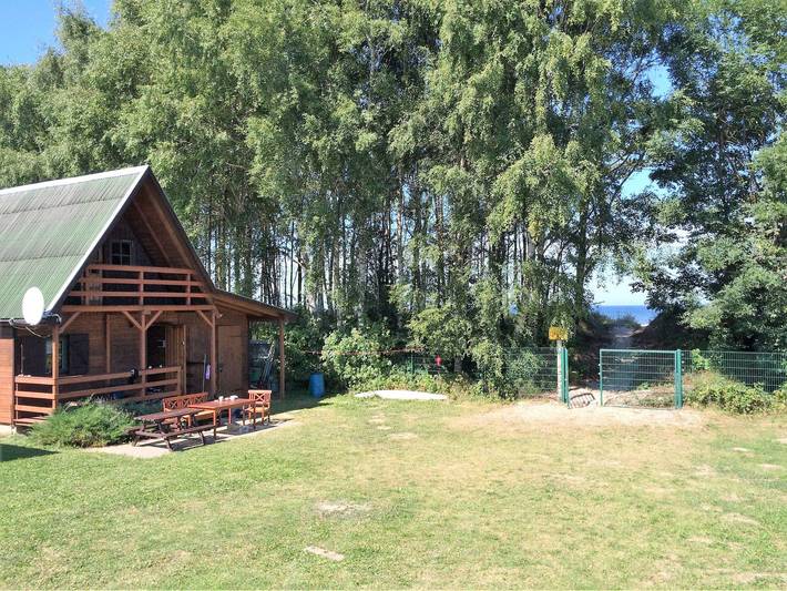 Bungalow für 4 Personen, mit Balkon und Terrasse sowie Garten und Seeblick