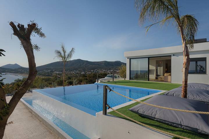 Casa de vacaciones para 6 personas, con jardín además de vistas al mar y terraza en Ática