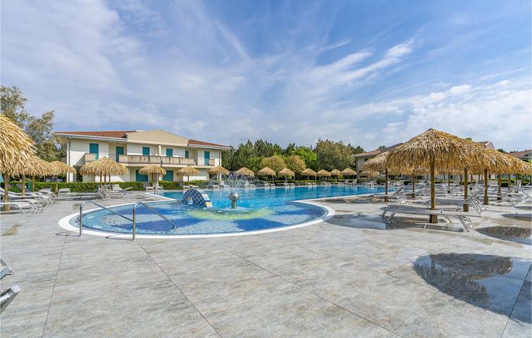 Ferienwohnung für 5 Personen, mit Terrasse und Pool, kinderfreundlich in Bibione