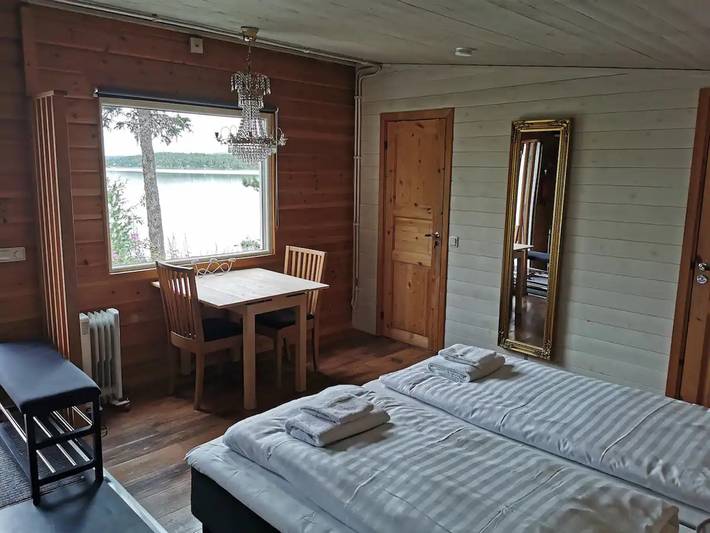 Urlaub am Wasser mit Nordlichtern oder Mitternachtssonne in Kiruna, Lappland