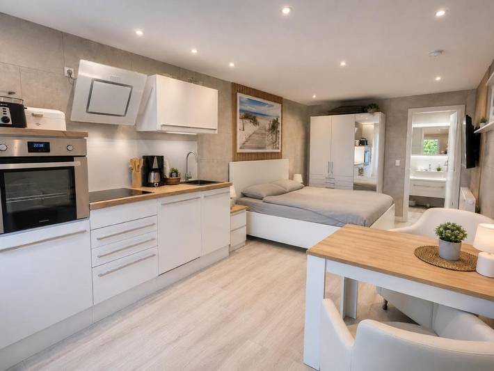 Ferienwohnung für 2 Personen, mit Ausblick und Garten sowie Seeblick, mit Haustier in Ückeritz