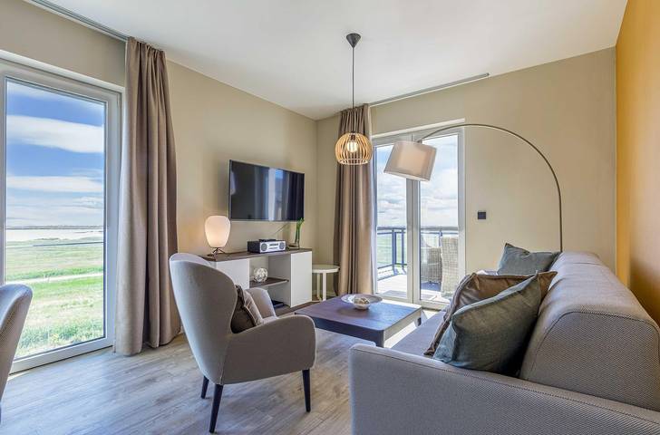 Ferienwohnung für 4 Personen, mit Sauna und Seeblick sowie Balkon in Wustrow