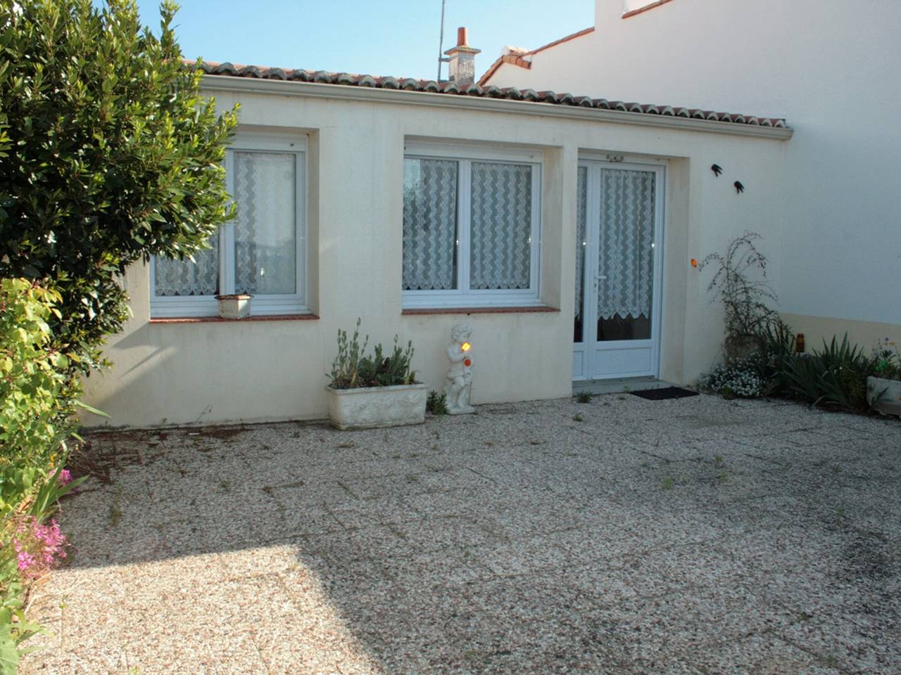 Casa cerca de la playa y del centro, acogedora con jardín, 2 dormitorios, parking y Wi-Fi in La Tranche-sur-Mer, Vandea