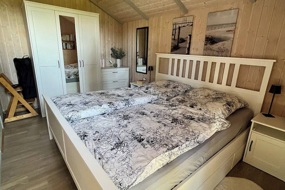Ferienhaus \"Sanderling\" -  gemütliches Holzhaus mit Blick auf die Schafswiesen in Kating, Tönning