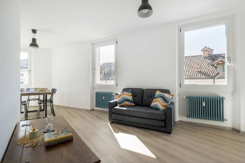 Entire apartment, Guesthost - Elegant apartment of 65 sqm, for 4 people, located on the third floor of a building with an elevator (Not suitable to disabled guests - 4 steps). The property is located in the heart of Belluno's historic center, in a panoramic position offer in Belluno, Schiara