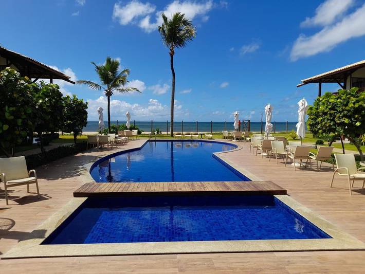 Casas e apartamentos de temporada para 6 pessoas, com jardim e vista e ainda vista para o lago and piscina em Itacimirim