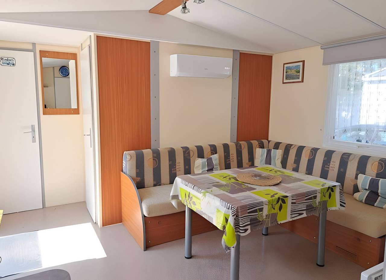 Casa móvil para 4 personas con aire acondicionado, piscina compartida y terraza privada in La Cotinière, Saint-Pierre-d'Oléron