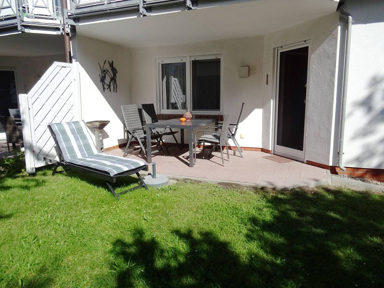 Helle Erdgeschosswohnung mit möblierter und überdachter Südterrasse!, foto 10