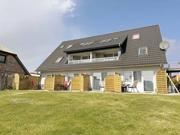 Ganze Ferienwohnung, Mr: Haus Inselperle mit Blick auf den Bodden - Wohnung 04 mit Terrasse und Boddenblick in Alt Reddevitz, Mönchgut