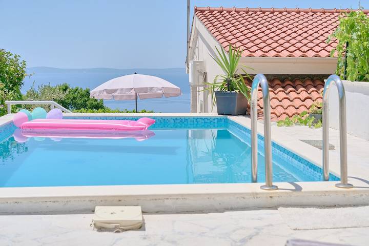 Ferienhaus für 4 Personen, mit Meerblick und Pool sowie Garten - 1