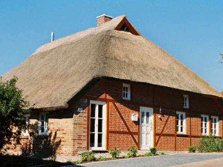 Ferienwohnung für 4 Personen, mit Terrasse und Garten sowie Sauna und Seeblick in Groß Zicker