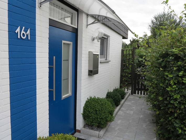 Ferienhaus für 4 Personen, mit Garten und Ausblick sowie Terrasse und Seeblick in Wesermarsch