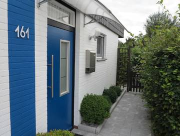 Ferienhaus für 4 Personen, mit Ausblick und Seeblick sowie Terrasse und Garten in Wesermarsch