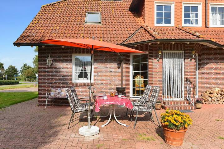 Ferienwohnung für 4 Personen, mit Terrasse und Garten sowie Ausblick in Dunum - 2