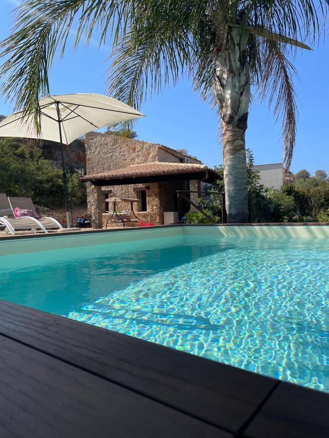 Ferienhaus für 7 Personen, mit Terrasse und Garten sowie Pool und Ausblick