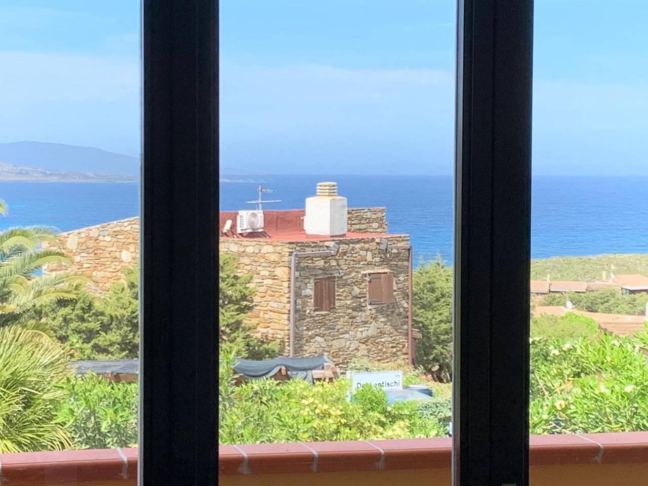 Casa de vacaciones 'Villino Le Ortensie' con vistas al mar, jardín y aire acondicionado in Stintino, Nurra