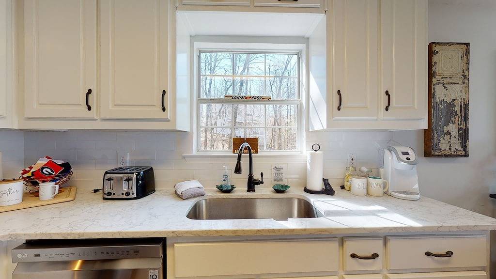 Breathtaking porch just steps from the water. in Lake Oconee