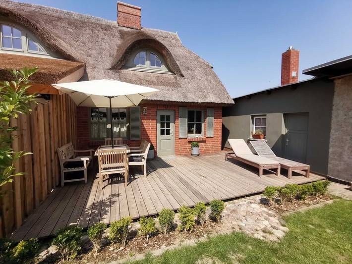 Ferienwohnung für 6 Personen, mit Terrasse und Garten sowie Seeblick und Ausblick in Lancken-Granitz - 3