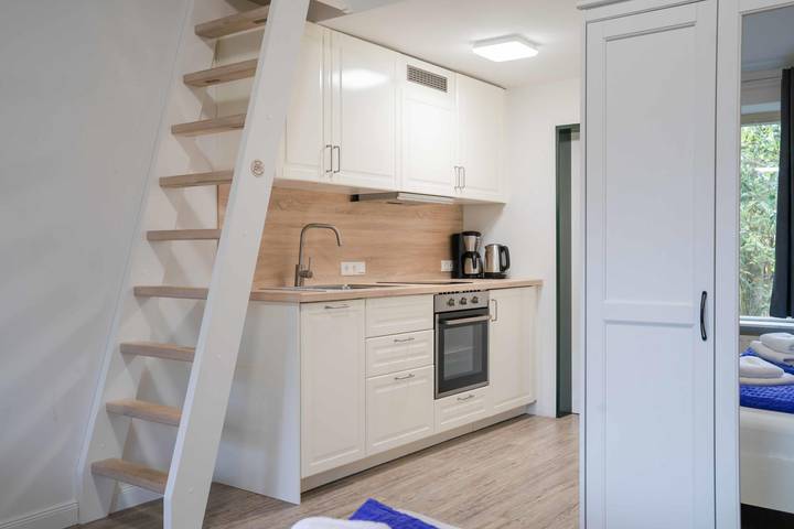 Ferienwohnung für 4 Personen, mit Sauna und Garten sowie Terrasse, mit Haustier in Esgrus