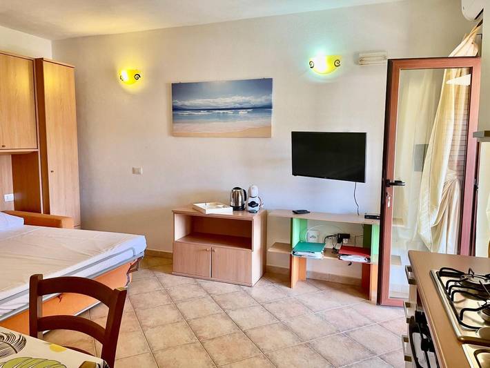 Monolocale intero, Appartamento 'New Orange Studio' in Limpiddu, Budoni