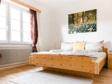 Ferienwohnung für 3 Personen, mit Ausblick und Garten sowie Balkon und Seeblick in Steinbach am Attersee