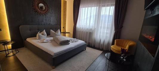 Gîte pour 2 personnes, avec terrasse ainsi que vue et jardin dans Baia Mare