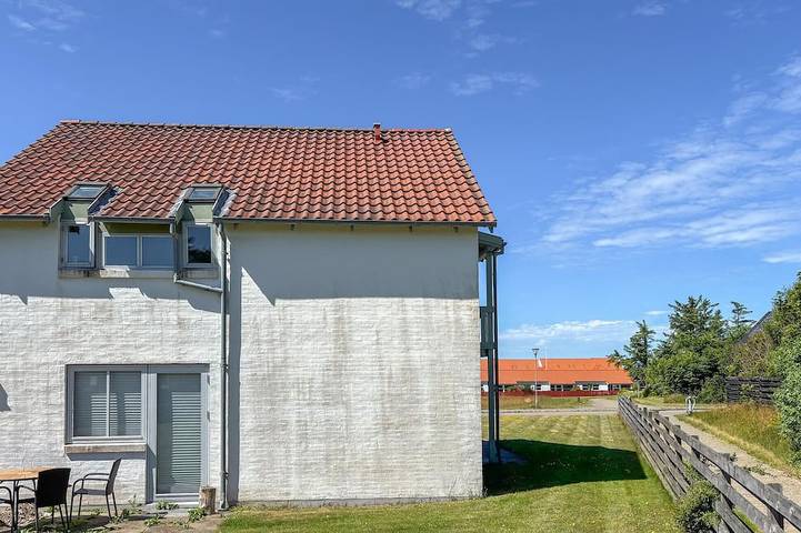 Ferienhaus für 4 Personen, mit Balkon und Garten