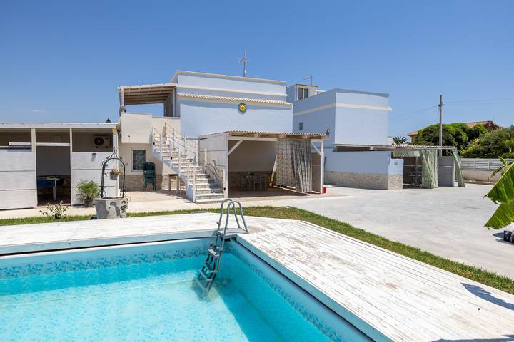 Appartamento intero, Appartamento 'Stella Marina' con piscina condivisa, Wi-Fi e aria condizionata in Granelli, Pachino