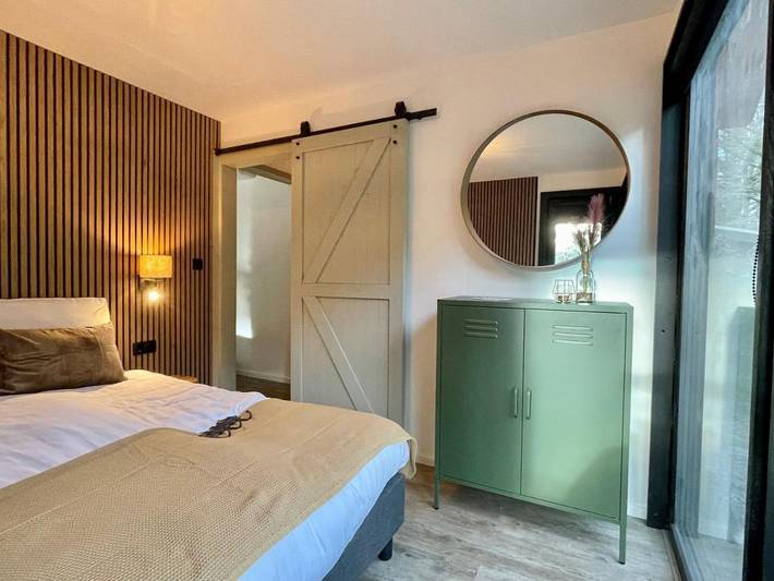 Ferienhaus für 4 Personen, mit Balkon und Whirlpool sowie Terrasse und Garten