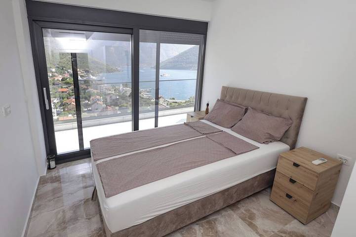 The house is our passion project, built with love surrounded by forest and views in Kamenari, Bay of Kotor
