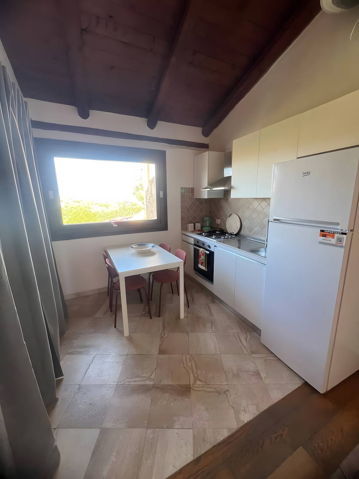 Appartamento "Residence Orizzonti N 25" con vista mare e terrazza privata in Quinta Spiaggia, Golfo Aranci