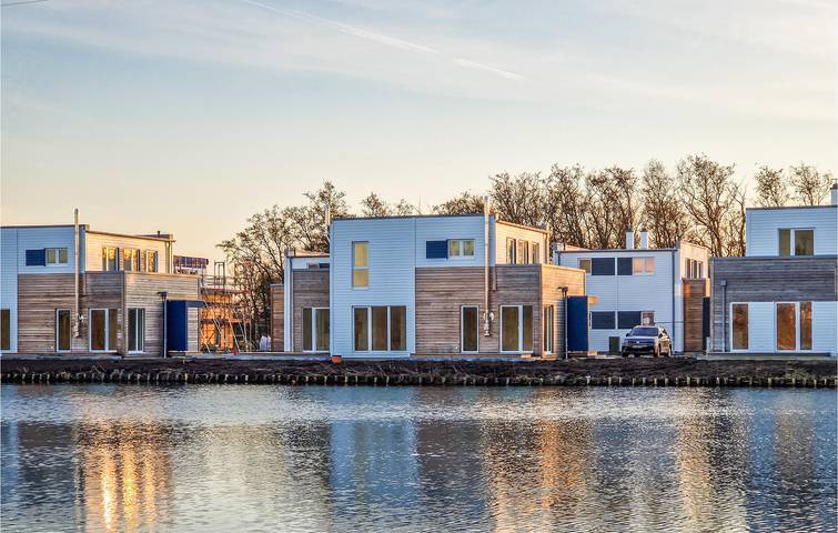 Ferienhaus für 4 Personen, mit Terrasse und Garten sowie Seeblick in Wesermarsch