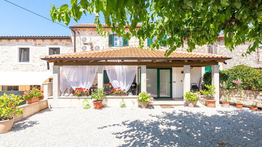 Ferienhaus für 4 Personen, mit Garten