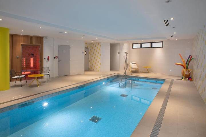 Appartement de vacances pour 2 personnes, avec piscine ainsi que sauna et terrasse