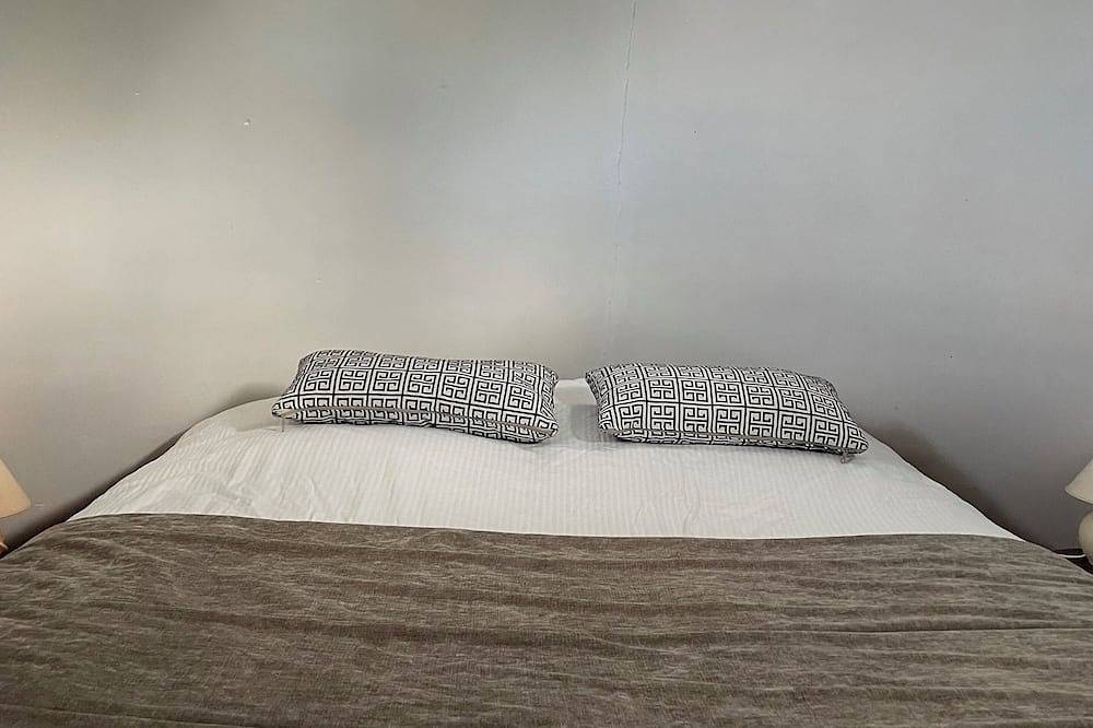 Mill overlooking the sea and the Breton countryside in Lanmodez, Rosa Granitküste