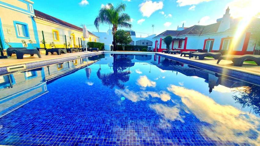 Vivendas de férias para 5 pessoas, com piscina e vista e ainda piscina infantil and jardim em Ria Formosa