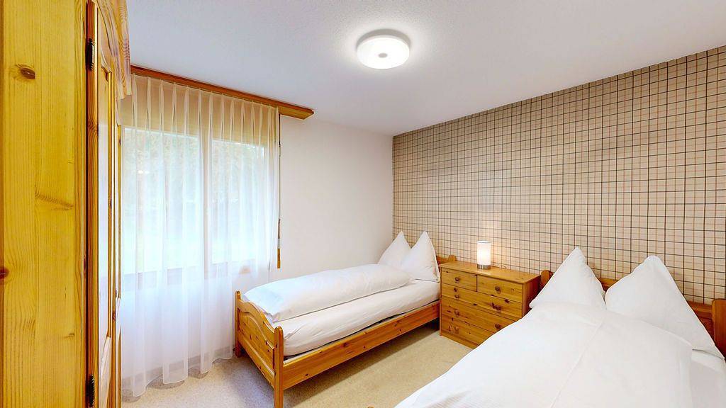 Ganze Wohnung, Casa Erizun E3 – ruhige Wohnanlage mit 5 Häusern nahe Flims-Waldhaus. in Flims-Dorf, Flims