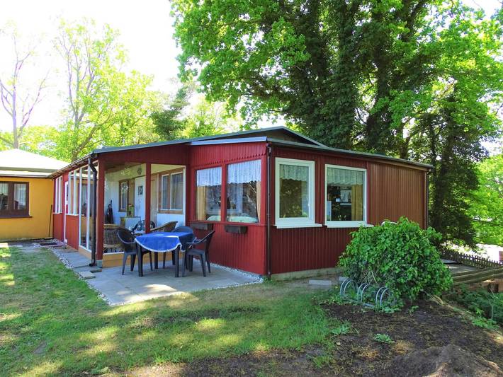 Ferienhaus für 4 Personen, mit Garten und Ausblick sowie Seeblick und Terrasse in Loddin
