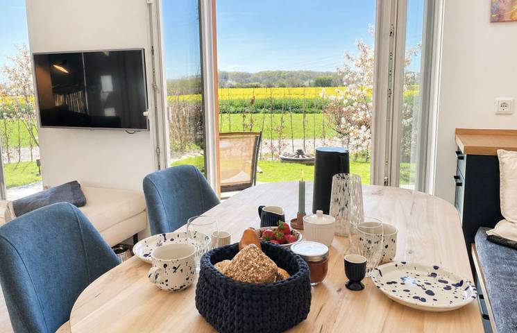 Ferienhaus für 3 Personen, mit Terrasse und Garten sowie Ausblick in Husby
