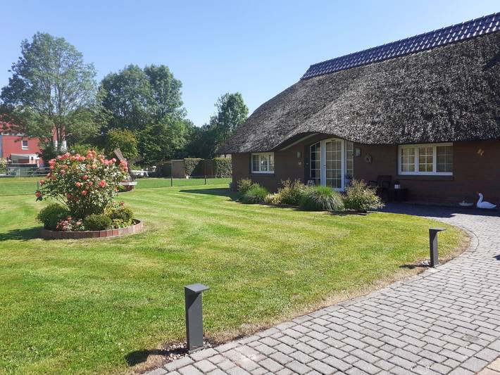 But 79 - Reetdach-Ferienhaus am Deich in Butjadingen, Wesermarsch